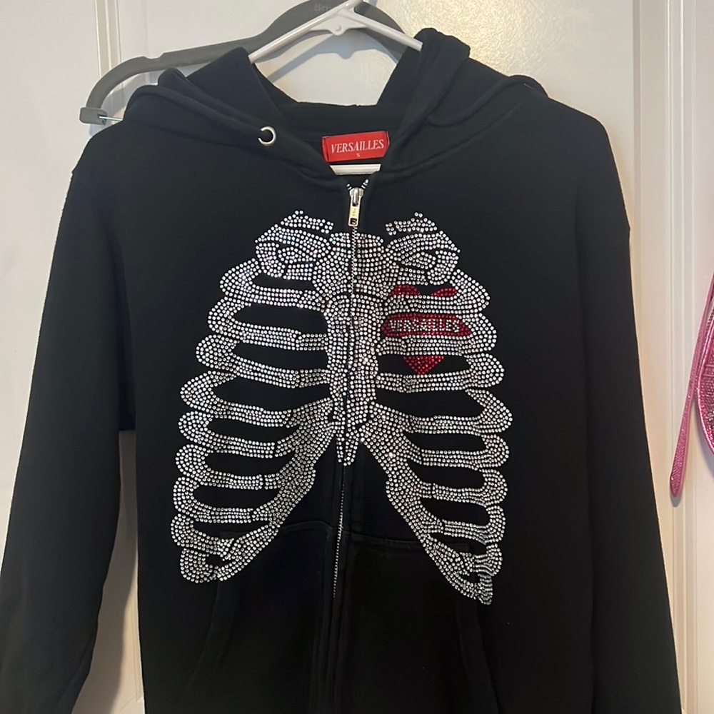 Bedazzled black zip up sweater